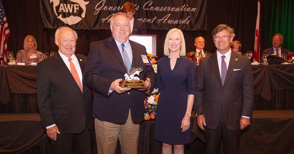Stuart McGregor '84 receives his award for Fisheries Conservationist of the Year.